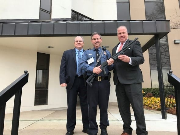 Anti-Fraud Chief Investigator Rick Wagnon (left), Coweta Police Department Chief Mike Bell and Insurance Commissioner Glen Mulready (right) on Thursday in Oklahoma City, OK.